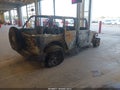 2009 Jeep Wrangler Unlimited — photo 4 of 10 | VIN 1J4GZ39139L721856
