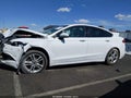 2018 Ford Fusion — photo 14 of 16 | VIN 3FA6P0H75JR243172