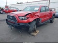 2018 Toyota Tacoma — photo 2 of 16 | VIN 3TMDZ5BN0JM041952