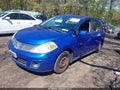 2009 Nissan Versa — photo 2 of 12 | VIN 3N1BC13E89L392693