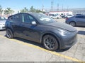 2024 Tesla Model Y — photo 1 of 24 | VIN 7SAYGDEEXRF181295