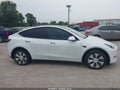 2022 Tesla Model Y — photo 11 of 14 | VIN 7SAYGAEE0NF401570