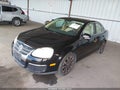 2009 Volkswagen Jetta — photo 2 of 16 | VIN 3VWRZ71K09M015966
