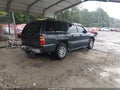 2003 Chevrolet Suburban 1500 — photo 4 of 15 | VIN 1GNFK16Z83J342267