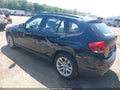 2015 BMW X1 — photo 3 of 14 | VIN WBAVL1C58FVY28218