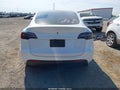 2023 Tesla Model Y — photo 17 of 20 | VIN 7SAYGDEE5PF834693