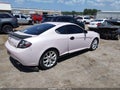 2008 Hyundai Tiburon — photo 4 of 16 | VIN KMHHN66F08U290159