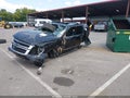 2015 Chevrolet Tahoe — photo 2 of 15 | VIN 1GNSKBKC5FR179718