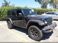 2023 Jeep Wrangler — photo 1 of 16 | VIN 1C4HJXFG1PW642263