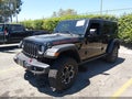 2023 Jeep Wrangler — photo 2 of 16 | VIN 1C4HJXFG1PW642263