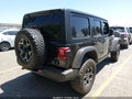 2023 Jeep Wrangler — photo 4 of 16 | VIN 1C4HJXFG1PW642263