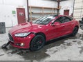 2014 Tesla Model S — photo 2 of 20 | VIN 5YJSA1H15EFP36370