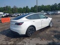 2024 Tesla Model Y — photo 4 of 17 | VIN 7SAYGAEE7RF204594