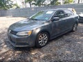 2014 Volkswagen Jetta — photo 2 of 16 | VIN 3VWD17AJ5EM312010