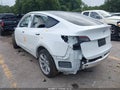 2023 Tesla Model Y — photo 3 of 18 | VIN 7SAYGDEE5PA173793