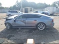 2016 Audi A7 — photo 14 of 16 | VIN WAU2GAFC3GN020121