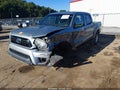 2015 Toyota Tacoma — photo 2 of 17 | VIN 3TMLU4EN1FM197361