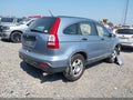 2009 Honda CR-V — photo 4 of 13 | VIN 5J6RE48369L065780