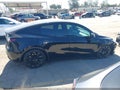 2025 Tesla Model Y — photo 13 of 18 | VIN 7SAYGDEE6SF299530