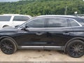 2020 Lincoln Nautilus — photo 14 of 16 | VIN 2LMPJ8K90LBL23084