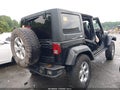 2015 Jeep Wrangler Unlimited — photo 4 of 13 | VIN 1C4HJWFGXFL621356