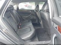 2013 Volkswagen Passat — photo 8 of 11 | VIN 1VWCN7A32DC047354