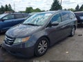 2014 Honda Odyssey — photo 2 of 16 | VIN 5FNRL5H66EB133990