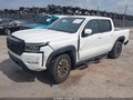 2022 Nissan Frontier — photo 2 of 16 | VIN 1N6ED1EK4NN600506