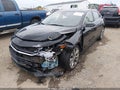 2018 Chevrolet Malibu — photo 2 of 16 | VIN 1G1ZE5SX4JF155738