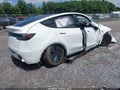 2026 Tesla Model Y — photo 4 of 14 | VIN 7SAYGDEE8TF403016
