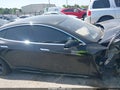 2016 Tesla Model S — photo 12 of 17 | VIN 5YJSA1E21GF149485