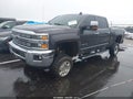 2015 Chevrolet Silverado 2500 — photo 2 of 16 | VIN 1GC1KWE87FF516376