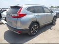 2017 Honda CR-V — photo 4 of 16 | VIN 2HKRW1H96HH501102