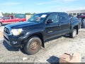 2013 Toyota Tacoma — photo 2 of 16 | VIN 3TMLU4EN0DM107033