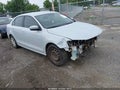 2017 Volkswagen Jetta — photo 1 of 12 | VIN 3VW2B7AJ1HM325202