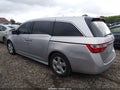 2012 Honda Odyssey — photo 13 of 16 | VIN 5FNRL5H97CB007483
