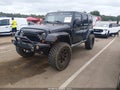 2013 Jeep Wrangler Unlimited — photo 2 of 20 | VIN 1C4HJWEG2DL696485