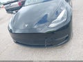 2023 Tesla Model Y — photo 12 of 18 | VIN 7SAYGAEE0PF703945
