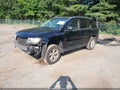 2014 Jeep Compass — photo 2 of 15 | VIN 1C4NJCBA2ED725707