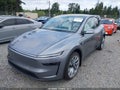 2026 Tesla Model Y — photo 2 of 21 | VIN 7SAYGDEE5TF454781