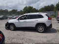 2014 Jeep Cherokee — photo 14 of 16 | VIN 1C4PJLCS7EW105858