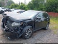 2015 Nissan Rogue — photo 2 of 11 | VIN 5N1AT2MV6FC843796