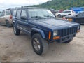 2001 Jeep Cherokee — photo 1 of 13 | VIN 1J4FF48S51L599168
