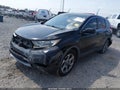 2018 Honda CR-V — photo 2 of 16 | VIN 7FARW1H81JE004796