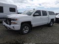 2018 Chevrolet Silverado 1500 — photo 2 of 19 | VIN 3GCUKRECXJG613744