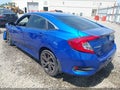2019 Honda Civic — photo 3 of 17 | VIN 19XFC2F83KE046121