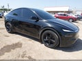 2026 Tesla Model Y — photo 1 of 11 | VIN 7SAYGDEE6TF377001