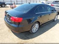 2013 Volkswagen Jetta — photo 4 of 16 | VIN 3VWLL7AJ4DM415410