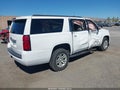 2020 Chevrolet Suburban — photo 4 of 16 | VIN 1GNSCHKC4LR122549