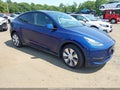 2023 Tesla Model Y — photo 1 of 19 | VIN 7SAYGDEE4PA125959